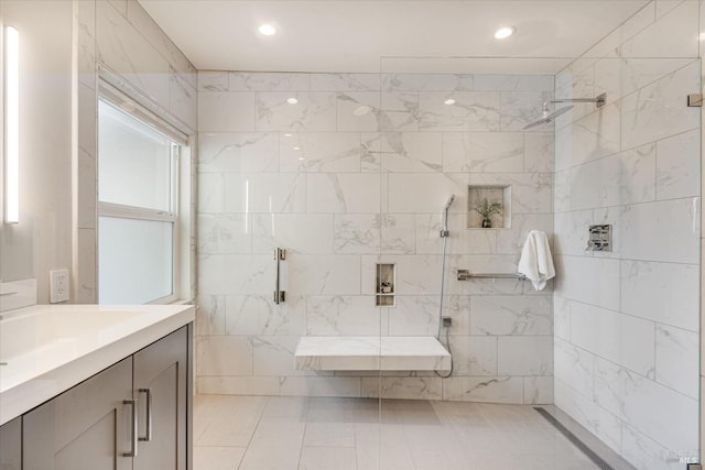 full bath with vanity, recessed lighting, and a shower stall