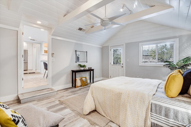 bedroom with a ceiling fan, vaulted ceiling with beams, wood finished floors, baseboards, and visible vents