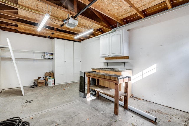 basement with a workshop area