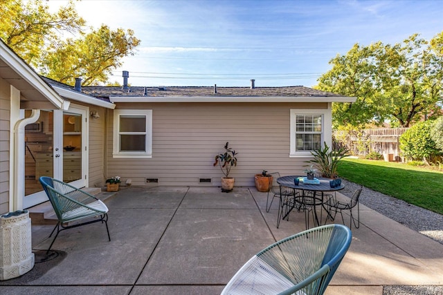 view of patio / terrace featuring outdoor dining space and fence