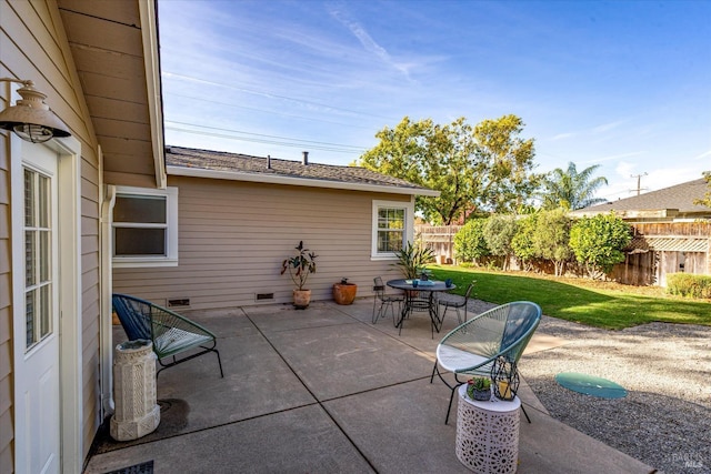 view of patio / terrace featuring outdoor dining area and fence