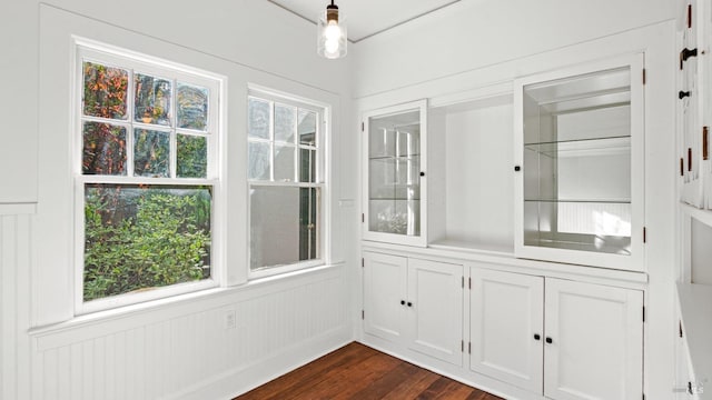 unfurnished sunroom with a wealth of natural light