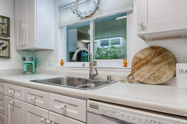 20 Meadowgreen Cir, Santa Rosa, CA 95409 - kitchen with a sink, dishwasher, white cabinetry, and light countertops