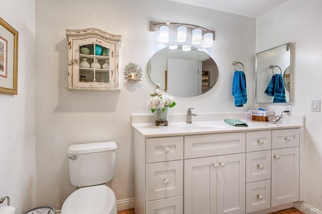 20 Meadowgreen Cir, Santa Rosa, CA 95409 - bathroom featuring toilet, vanity, and baseboards