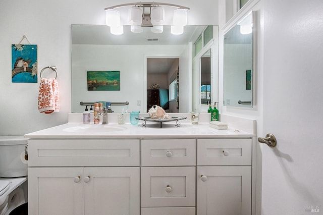 20 Meadowgreen Cir, Santa Rosa, CA 95409 - bathroom with double vanity, toilet, and a chandelier