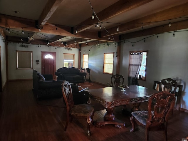 dining space with beamed ceiling, wood-type flooring, and plenty of natural light