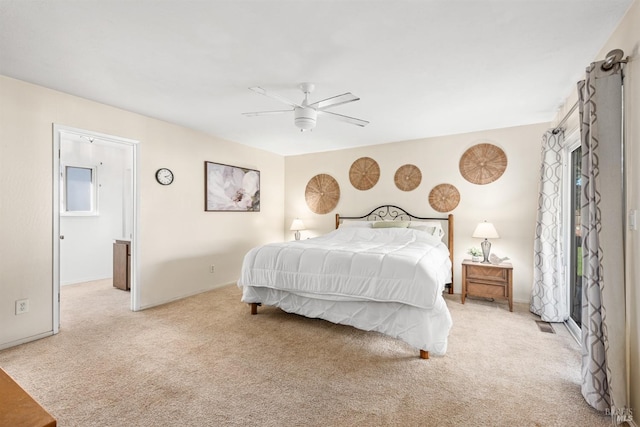 bedroom with light carpet and ceiling fan