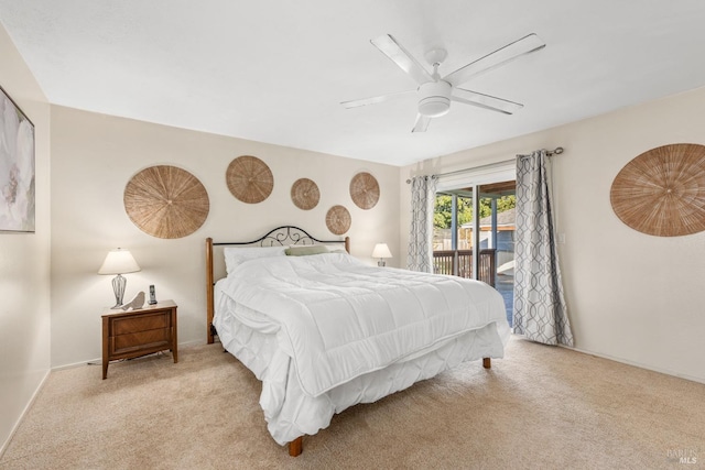 carpeted bedroom with ceiling fan and access to exterior