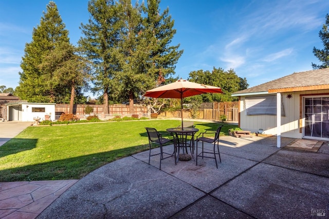 view of patio featuring a storage shed