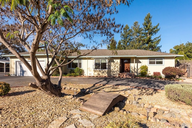 ranch-style home with a garage