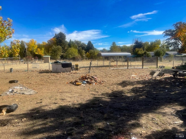 view of yard featuring a rural view