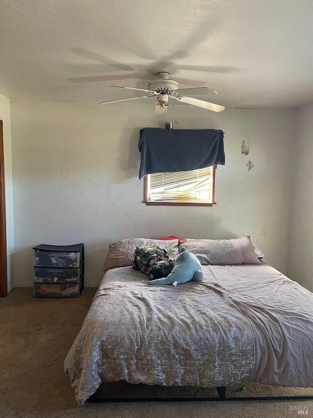 bedroom with carpet flooring and ceiling fan