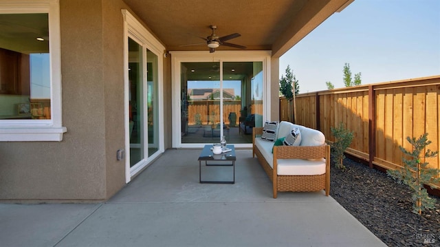 view of patio featuring an outdoor hangout area and ceiling fan