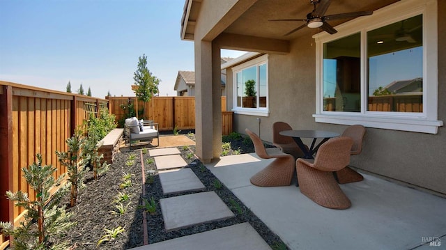 view of patio / terrace with ceiling fan