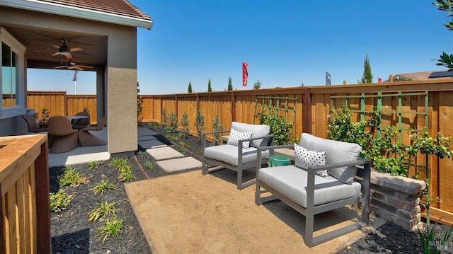 view of patio / terrace featuring ceiling fan