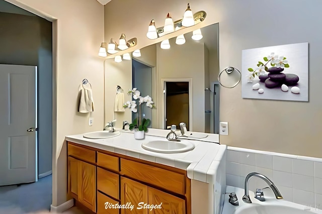 bathroom featuring a bathtub and vanity