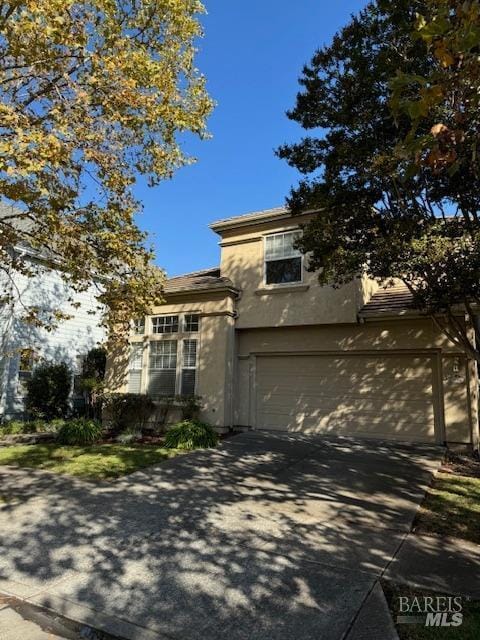 view of front of house with a garage