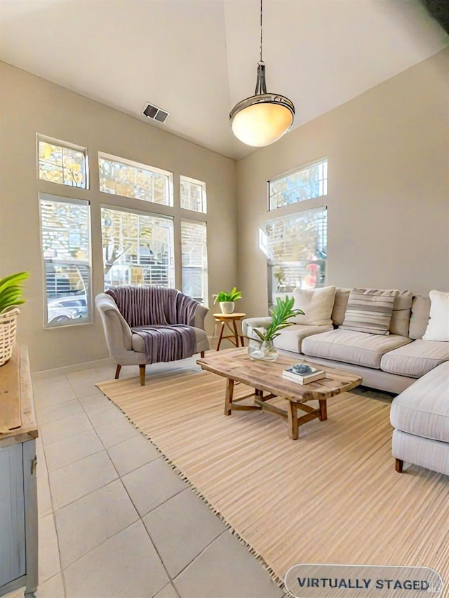 living room featuring light tile patterned flooring