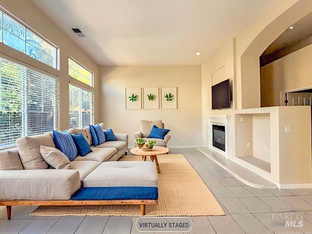 living room featuring tile patterned flooring