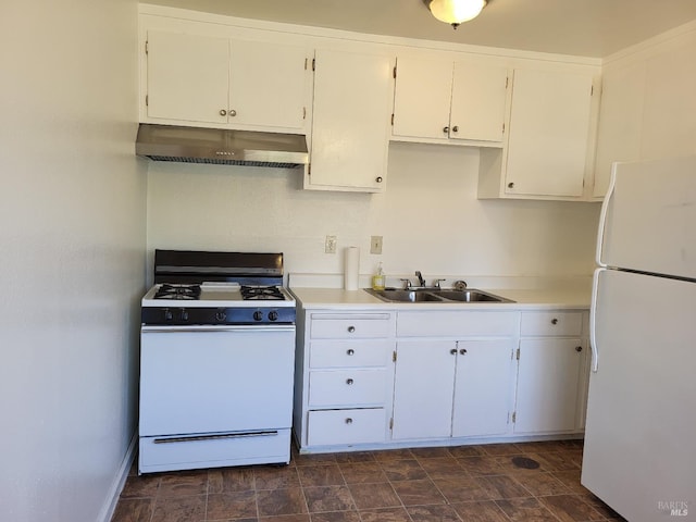 kitchen featuring white appliances, white cabinetry, extractor fan, and sink