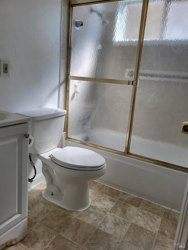 full bathroom with vanity, toilet, and enclosed tub / shower combo