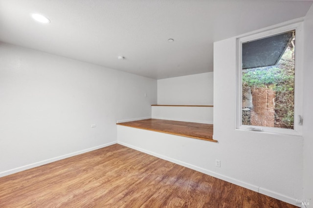 unfurnished room featuring light hardwood / wood-style flooring