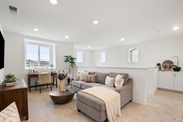 living room with light colored carpet