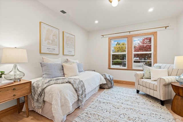 bedroom featuring light hardwood / wood-style floors