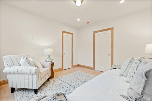 bedroom with light hardwood / wood-style flooring