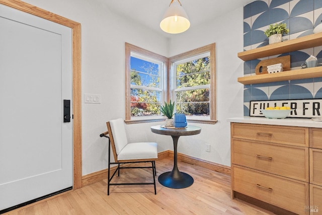 sitting room with light hardwood / wood-style floors