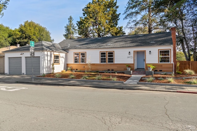 single story home with a garage