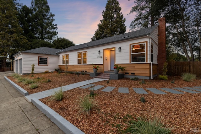 single story home featuring a garage