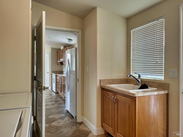 bathroom featuring a bath and sink