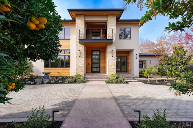 contemporary home featuring a balcony