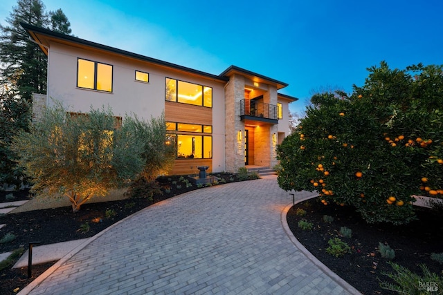 modern home featuring a balcony