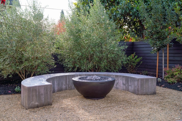 exterior space with an outdoor fire pit