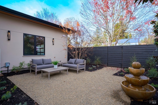 view of patio with an outdoor living space