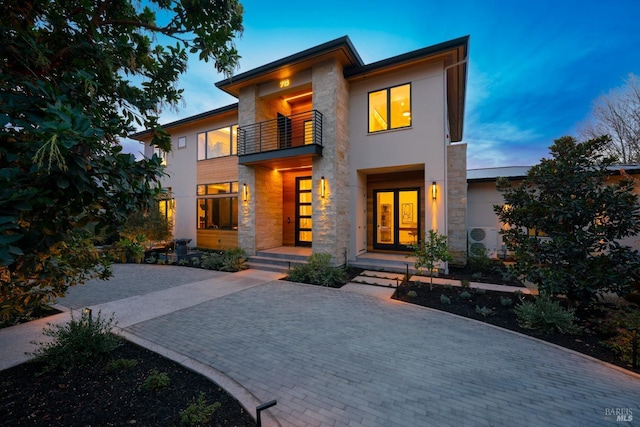 modern home featuring a balcony