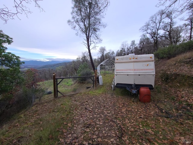 view of yard with a mountain view