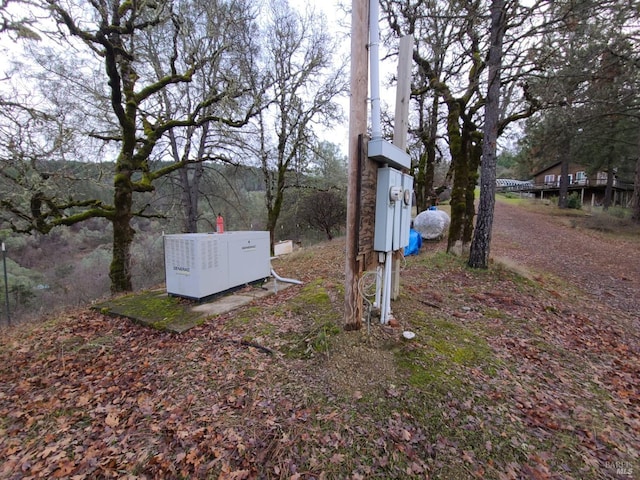 view of yard featuring a mail area