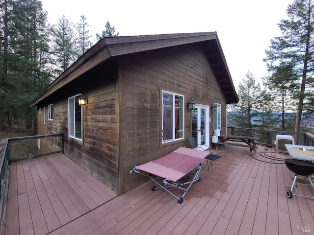 wooden terrace featuring french doors