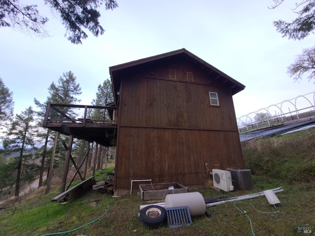 view of outdoor structure with central AC unit