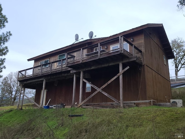 rear view of house with ac unit