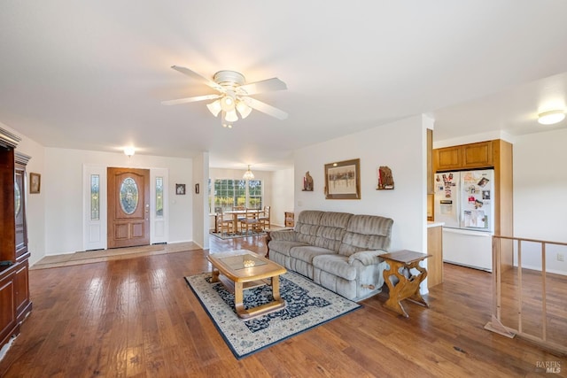 living room with hardwood / wood-style floors and ceiling fan