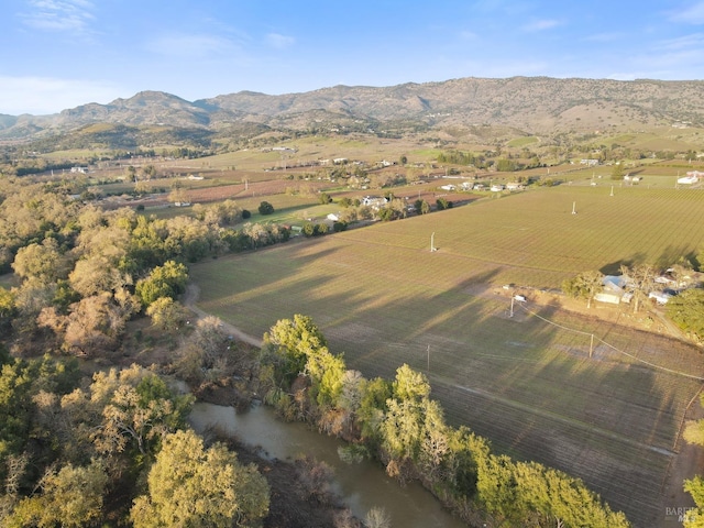 aerial view featuring a mountain view and a rural view