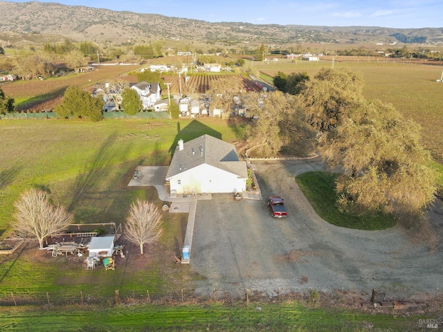 bird's eye view with a rural view and a mountain view