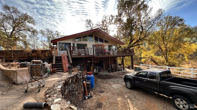 view of front of property featuring a deck