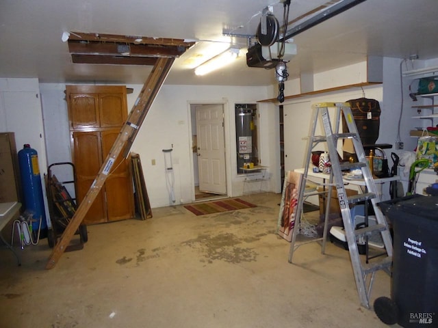 garage with a garage door opener and water heater