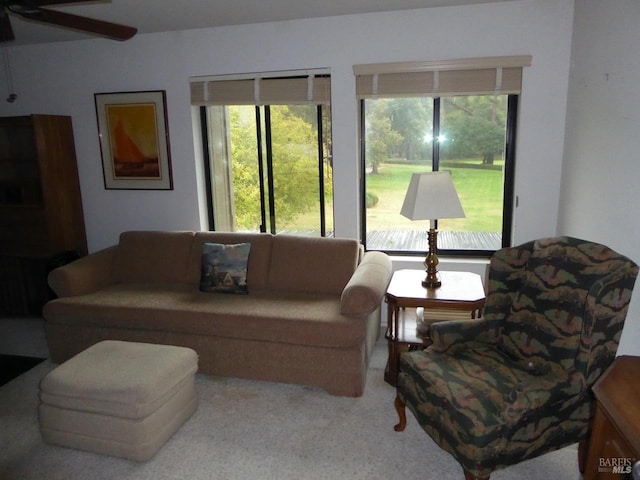 living room featuring ceiling fan