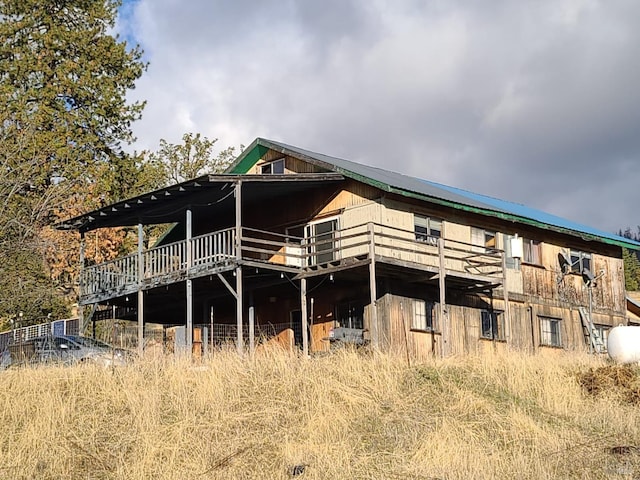 view of home's exterior with a deck